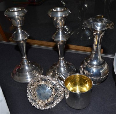 Lot 378 - A pair of silver candlesticks, silver cup, baluster vase and pin dish