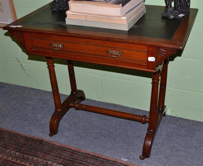 Lot 390 - A late Victorian walnut writing table