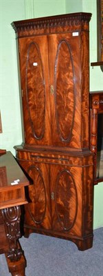 Lot 403 - Reproduction mahogany standing corner cupboard with pull-out slide