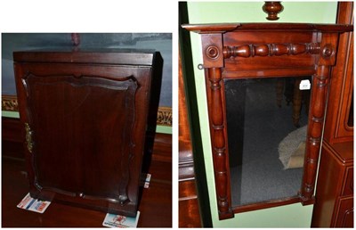 Lot 404 - A mahogany cabinet and a mahogany mirror