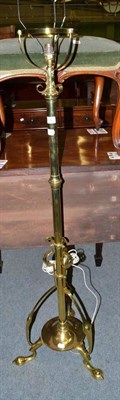 Lot 416 - An Art Nouveau brass standard lamp