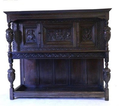 Lot 841 - An Impressive 18th Century Joined Oak Press Cupboard, the canopy top above a central carved...