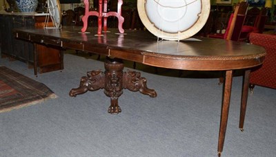 Lot 437 - Victorian extending dining table with central carved support decorated with dragon heads