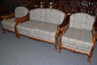 Lot 447 - Three piece walnut framed bergere suite