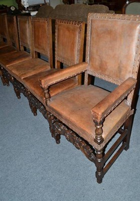 Lot 455 - Set of eight early 20th century leather armchairs including two carvers