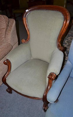 Lot 457 - Victorian spoon back armchair