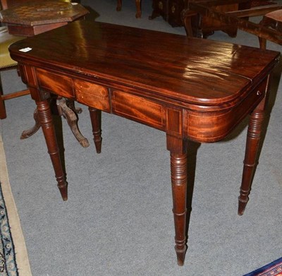 Lot 459 - George IV mahogany fold-over tea table