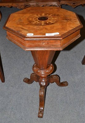 Lot 465 - A Victorian walnut sewing table