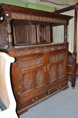 Lot 475 - A 19th century carved oak court cupboard in 17th century style