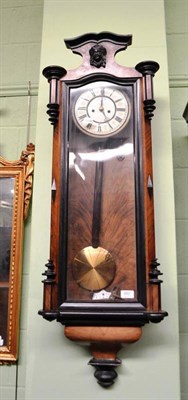 Lot 482 - Vienna type walnut and ebonised wall clock