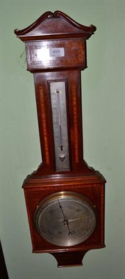 Lot 495 - A mahogany inlaid aneroid barometer