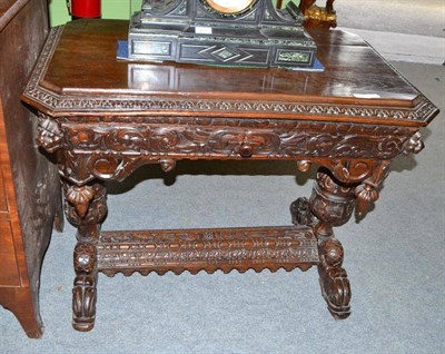 Lot 498 - Victorian carved oak centre table fitted with a drawer