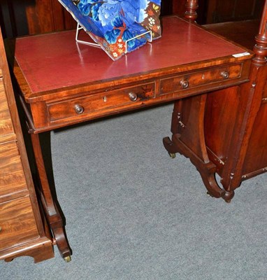 Lot 503 - An early Victorian mahogany writing table with two frieze drawers and a tooled leather top