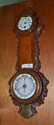 Lot 513 - An aneroid barometer combined timepiece (thermometer box missing)