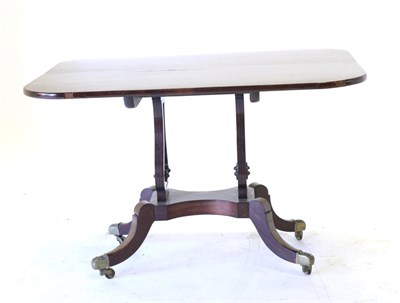 Lot 880 - A Regency Style Mahogany and Rosewood Crossbanded Lyre Shape Flip-Top Table, of rounded rectangular