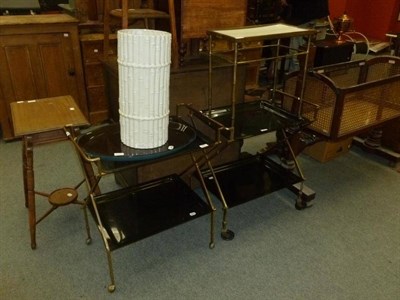 Lot 550 - Two brass and Perspex two-tier trolleys, two Perspex oval trays, small brass table and a Casa...