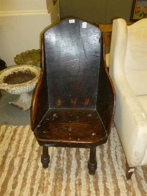 Lot 578 - An 18th century oak and elm primitive chair with winged sides (a.f.)