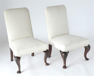 Lot 910 - A Pair of George II Style Mahogany High-Back Chairs, probably 19th century, upholstered in...