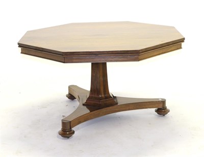 Lot 927 - A Regency Rosewood Octagonal Shaped Centre or Dining Table, early 19th century, raised on a...