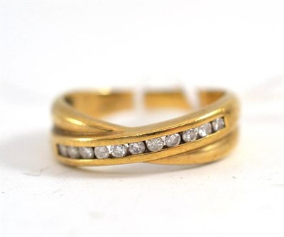 Lot 34 - A 9ct gold crossover ring