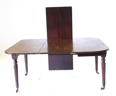 Lot 932 - A Regency Mahogany Extending Telescopic Dining Table, early 19th century, of rounded...