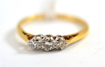 Lot 51 - A diamond three stone ring