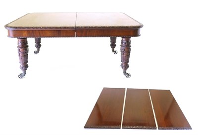 Lot 934 - An Impressive Victorian Carved Mahogany Wind-Out Dining Table, circa 1860, with three...