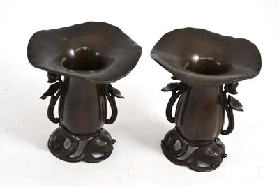 Lot 56 - A pair of Japanese bronze vases modelled as turtles supporting a lotus flower