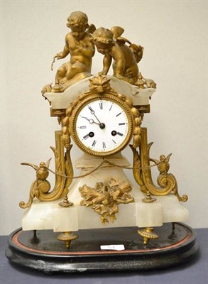 Lot 57 - A French alabaster mantel clock with gilt metal mounts