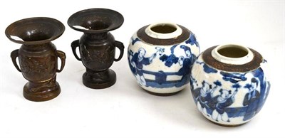 Lot 73 - Pair of Japanese bronze small vases and a pair of Chinese blue and white small jars