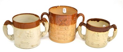 Lot 88 - Three salt glazed stoneware loving cups