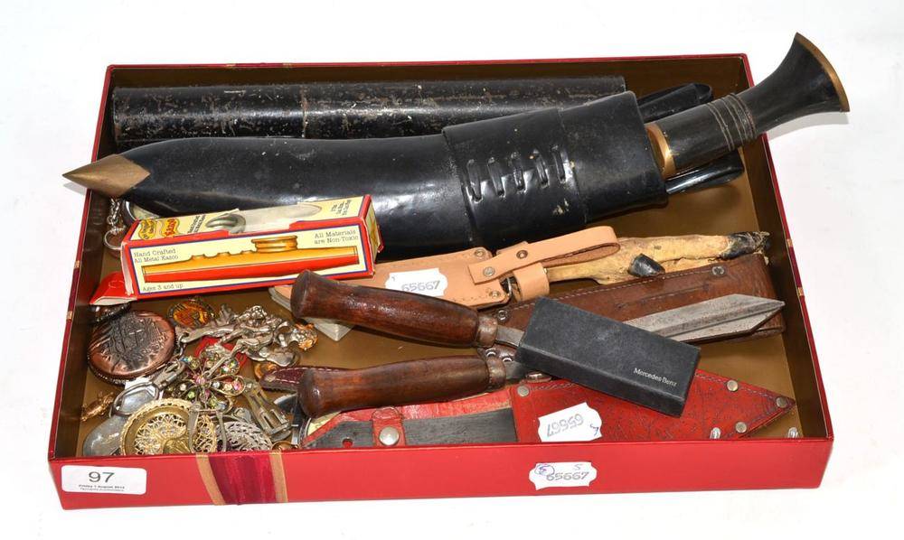 Lot 97 - An Indian Kukri, a copy of a Hitler Youth knife, a deer's foot knife, two cased throwing...