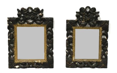 Lot 981 - An 18th Century Italian Rectangular Wall Mirror, the carved, gilded and brown painted frame...