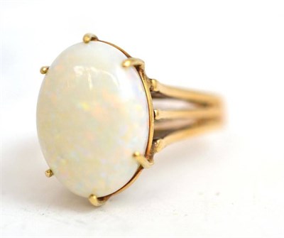 Lot 145 - A 9ct gold and opal ring