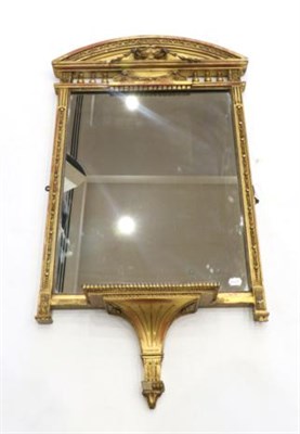 Lot 982 - A Regency Gilt and Gesso Wall Mirror, early 19th century, the architectural pediment above an...