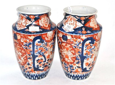 Lot 160 - A pair of Japanese Imari porcelain vases of lobed baluster form