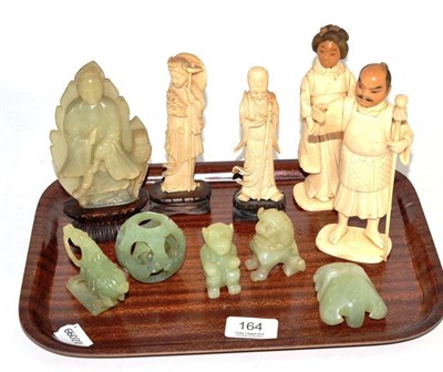 Lot 164 - A pair of Japanese bone figures, a pair of Chinese bone figures and six jade type carvings