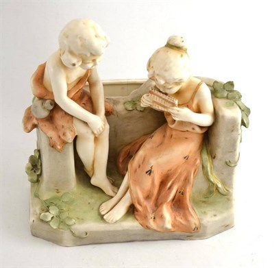 Lot 165 - A Czechoslovakian pottery figural vase