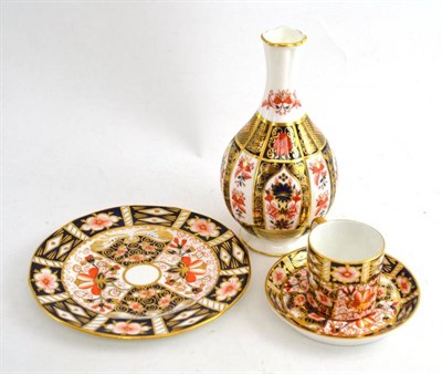 Lot 170 - A Royal Crown Derby vase, cup, saucer and plate