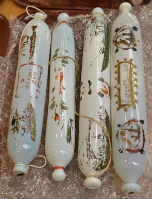 Lot 179 - Four 19th century opaque glass rolling pins, each painted with ships