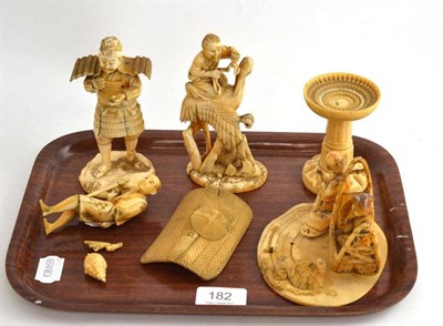 Lot 182 - Three ivory figures and a stand