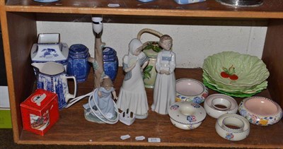 Lot 216 - A quantity of decorative ceramics including three Nao figures, Carltonware salad bowls, Maling...