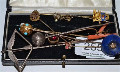 Lot 255 - A box containing ten stick pins