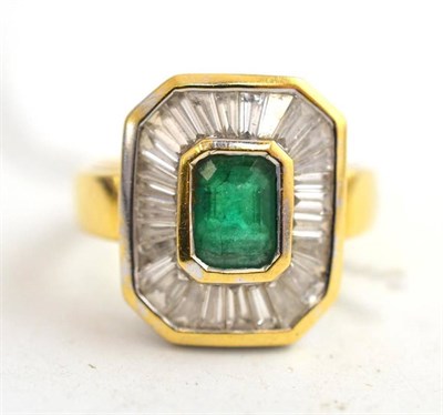 Lot 257 - An 18ct gold emerald and diamond cluster ring