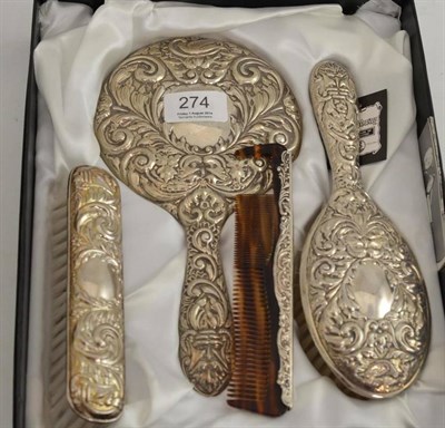 Lot 274 - Four piece silver mounted brush set