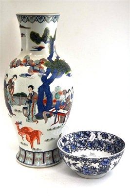 Lot 293 - A copy of a large Chinese vase painted with figures and a blue and white bowl (2)