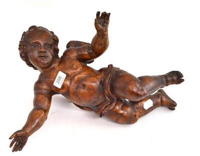 Lot 298 - A carved wood figure of a cherub