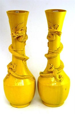 Lot 302 - Pair of Chinese yellow dragon vases (one with old crack)