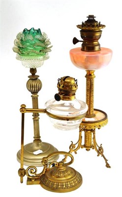 Lot 310 - Two small oil lamps and a fairy lamp