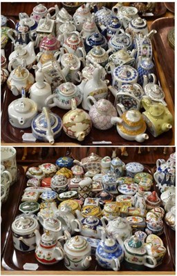 Lot 311 - Two trays of Del Prado Fine Porcelain trinket boxes, a collection of Porcelain Art teapots and...